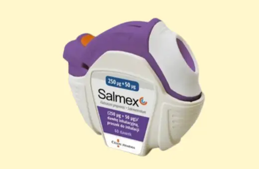 Fioletowo-biały inhalator Salmex, zawierający proszek do inhalacji, z widocznym napisem "Salmex" i informacją o dawce.