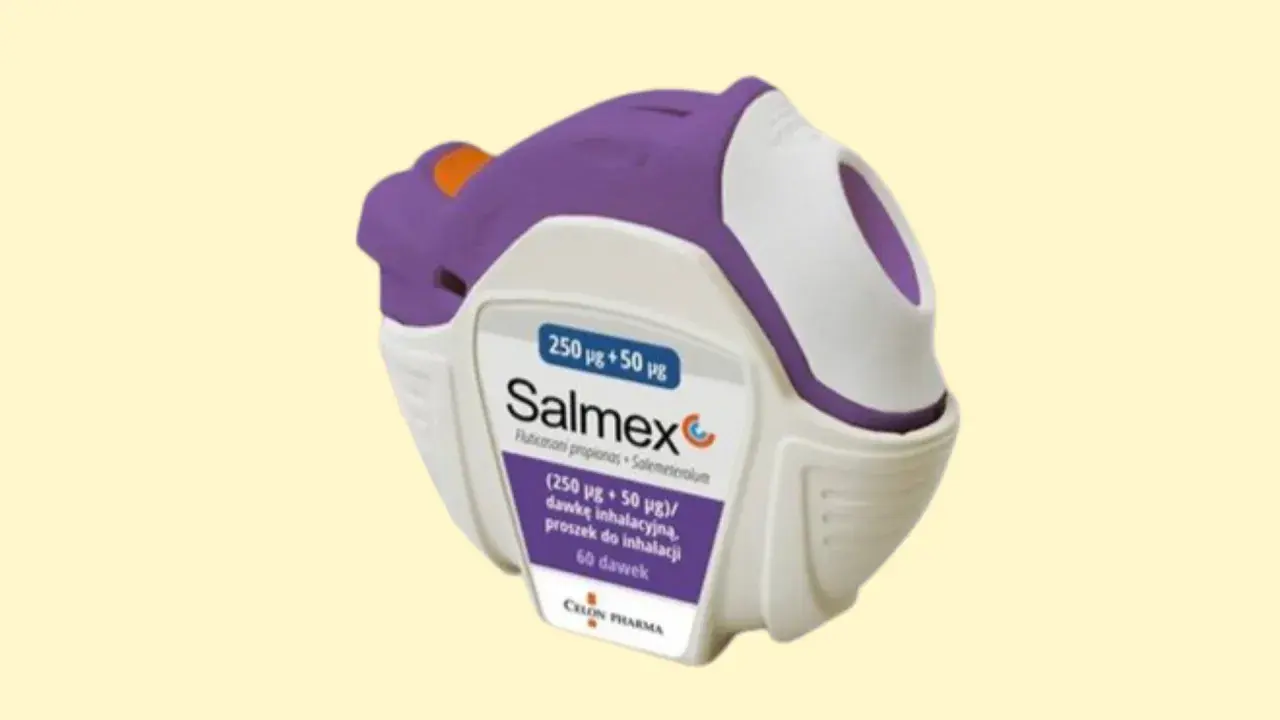 Fioletowo-biały inhalator Salmex, zawierający proszek do inhalacji, z widocznym napisem "Salmex" i informacją o dawce.